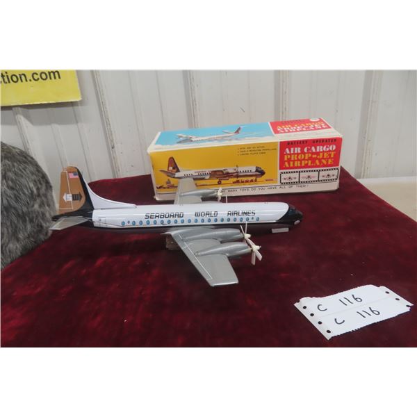 Marx Seaboard World Airlines Battery-Operated Tin Air Cargo Plane, 1960s, 14 1/2" Wingspan, in Box