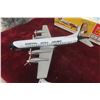 Image 4 : Marx Seaboard World Airlines Battery-Operated Tin Air Cargo Plane, 1960s, 14 1/2" Wingspan, in Box