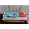 Image 9 : Marx Seaboard World Airlines Battery-Operated Tin Air Cargo Plane, 1960s, 14 1/2" Wingspan, in Box