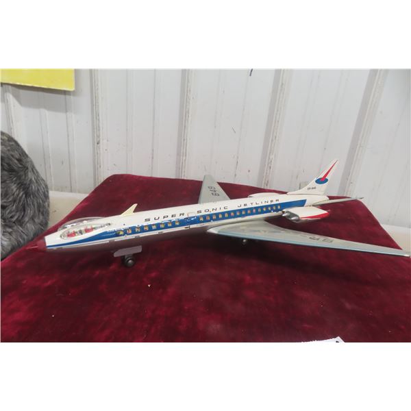 Tomiya DeLuxe Super Sonic Jet Liner No. 649, Tin Lithograph, Battery Operated, 19" Wingspan, 1960s