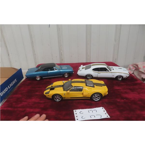3 x 1/18 Scale Die Cast Cars: 1967 Chevrolet Chevelle, 1969 Chevrolet, and Ford GT