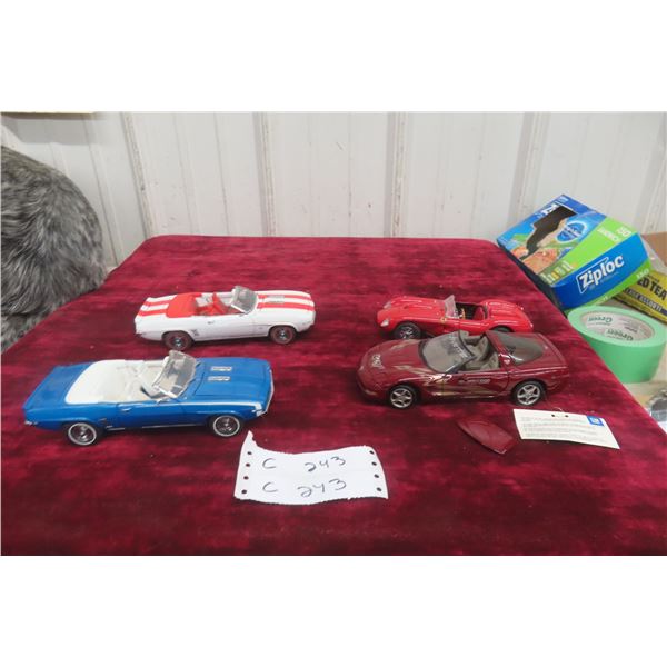 4 1/24 Scale Die Cast Cars and 2 Danbury Mint