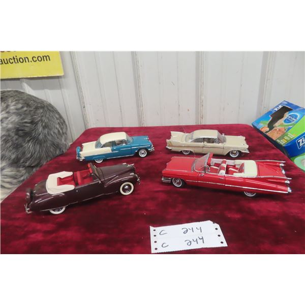 4 1/24 Scale Die Cast Cars and 2 Danbury Mint