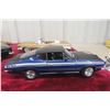 Image 2 : 3 1/18 Scale Die-Cast Cars: 1958 Bonneville, 1969 Plymouth Barracuda, 1956 Chevy Bel Air