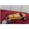 Image 4 : 3 1/18 Scale Die-Cast Cars: Cadillac Eldorado, Ford Thunderbird, 1934 Bugatti, and 1 Car Needing Re
