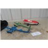 Image 1 : Three Boat Trailers Pressed Metal, Two Tandem and One Single Axle With One Plastic Boat Marked Budd