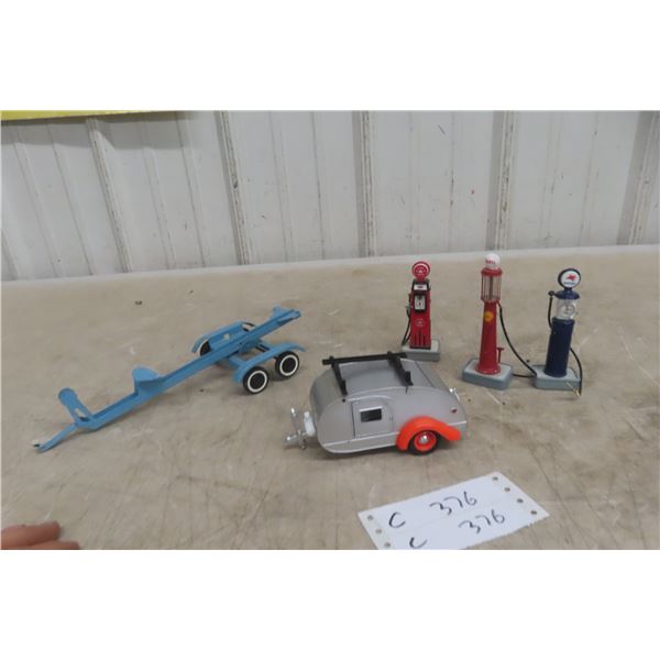Three Die Cast Gas Pumps, Pressed Metal Boat Trailer