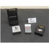 Image 1 : 2 Lighters (1 New Old Stock Zippo, 1 Roman) and 1 Zippo Tape Measure in a Case