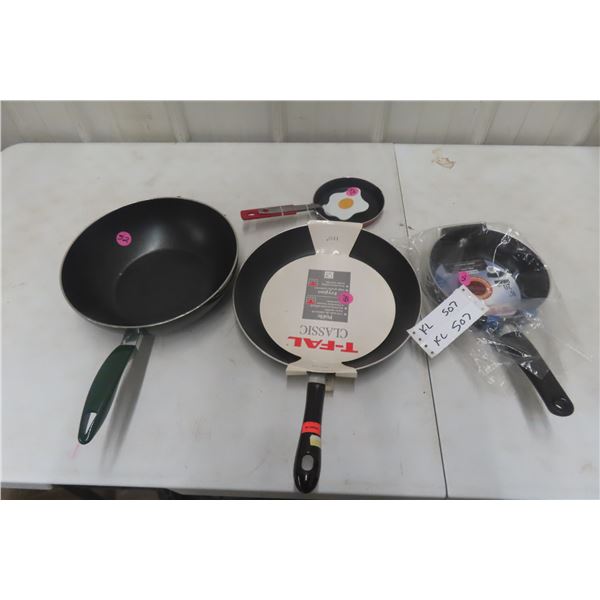 Two New T-FAL Fry Pans (One 11.5", One 8"), One New Egg Fry Pan, and One Gently Used Deep Wok Fry P