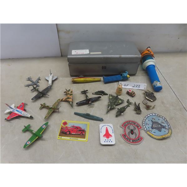 Toy Airplanes, Tiger Flashlight, Patches, Metal Box, and More