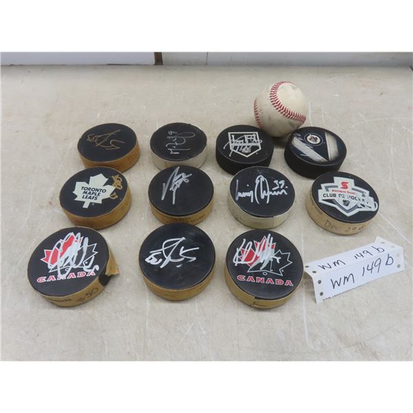 11 Autographed Pucks, No Certificate of Authenticity