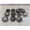 Image 1 : 11 Autographed Pucks, No Certificate of Authenticity