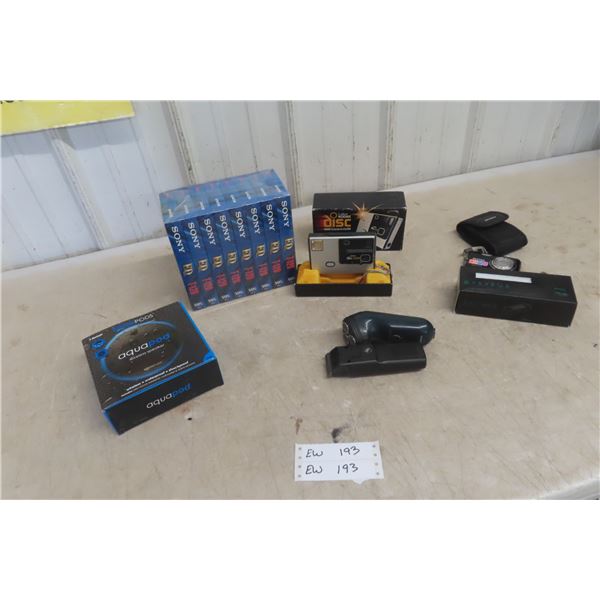 VHS Sealed Blank Tape x 5, Kodak Camera, Pitcher, Agenda Pad, Speaker Plus, Razer Plus