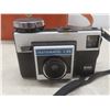 Image 6 : 2 Vintage Kodak Instamatic Cameras: X-15 & 104 - Film & Flashbulbs in a Leather Case