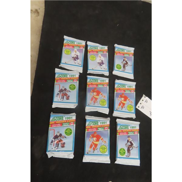 9 Sealed Packages of Score 1991 Hockey Cards