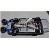 Image 7 : Moog Chassis NASCAR 00 Race Car – Ford Taurus 1/25th Scale in Display Case