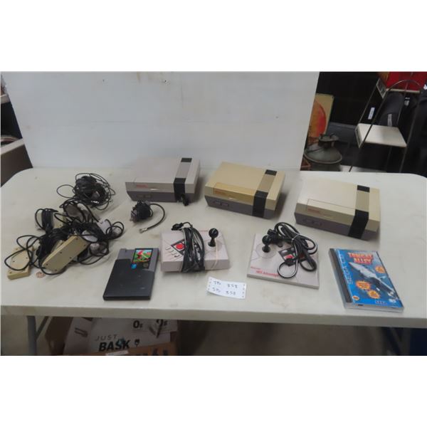 3 Nintendo Consoles, Controllers, 2 NES Advantage Pads, 2 Games