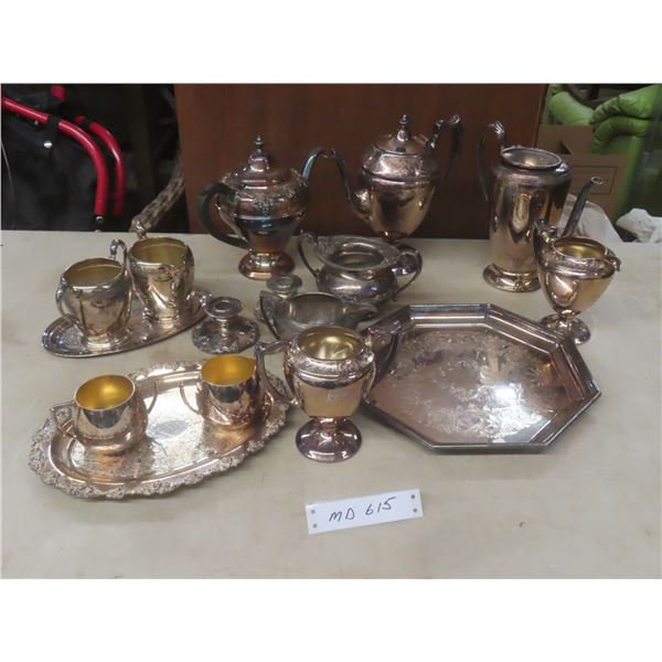Silver-Plated Tea Pot, Coffee Pots, Creamers, Sugar Bowl, Candlestick Holders and Trays