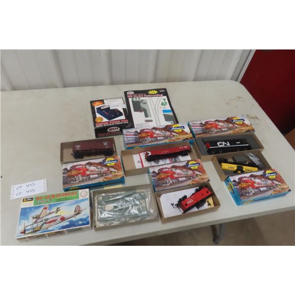 6 Athearn Train Sets with Boxes, Railroad Power Pro 1700, HO Railroading Book, KI-43 Hayabusa Plane