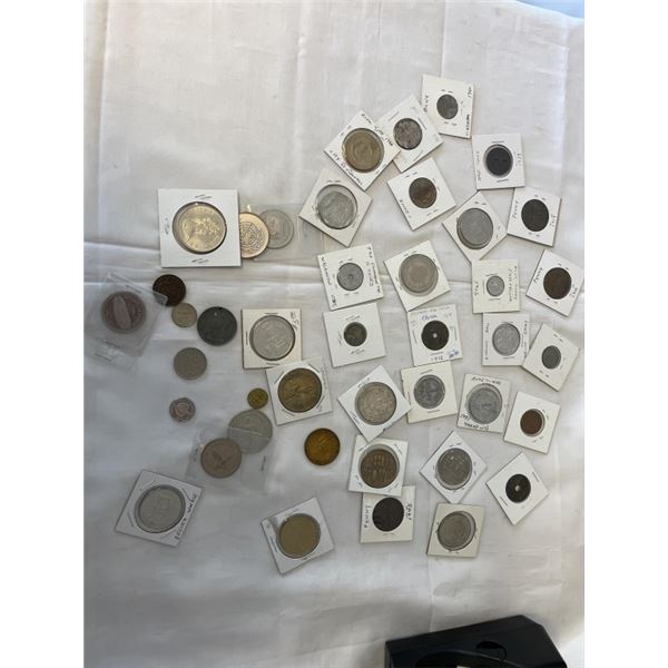 OVER 1LB FOREIGN COINS AND TOKENS, SOME SILVER TOKENS AND TRADE DOLLARS