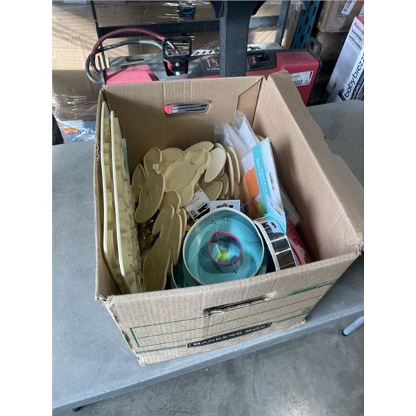 BOX OF NEW COOKIE CUTTERS, PLASTI MOLDS AND SPOON RESTS ETC