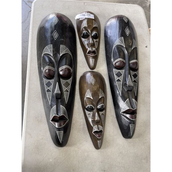4 CARVED MASKS