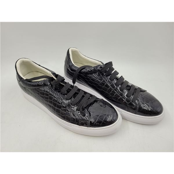 Pair of Crocodile Wear Shoes