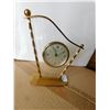 Image 1 : LINDEN HARP SHAPED LUCITE AND BRASS ALARM CLOCK SCARCE