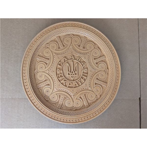 Wall hanging wood carved dish from Ukraine. 10.25” (26 cm) wide. Translation: “Glo