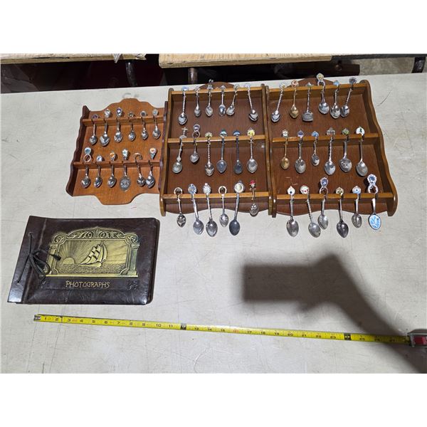 3 decorative spoon racks with spoons and photo book