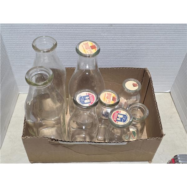 Glass milk bottles with lids