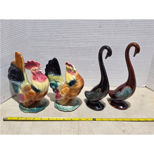 4 pottery statues- roosters and swans