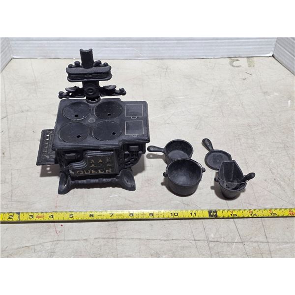 Miniature cast iron stove and accessories