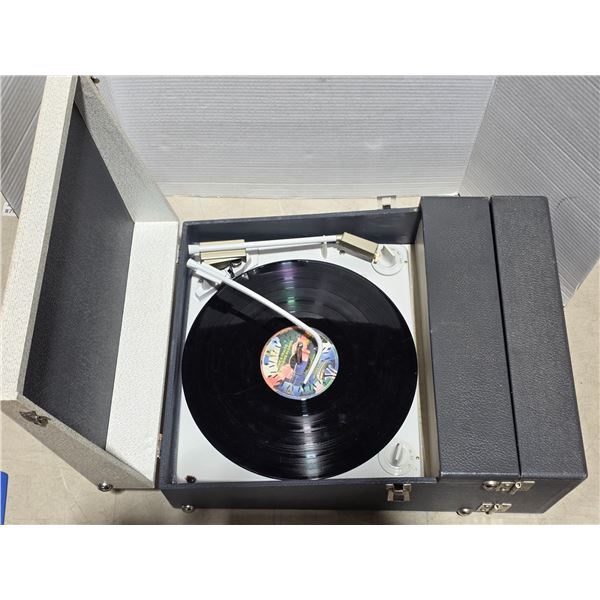 Carry case with built in record player and speaker