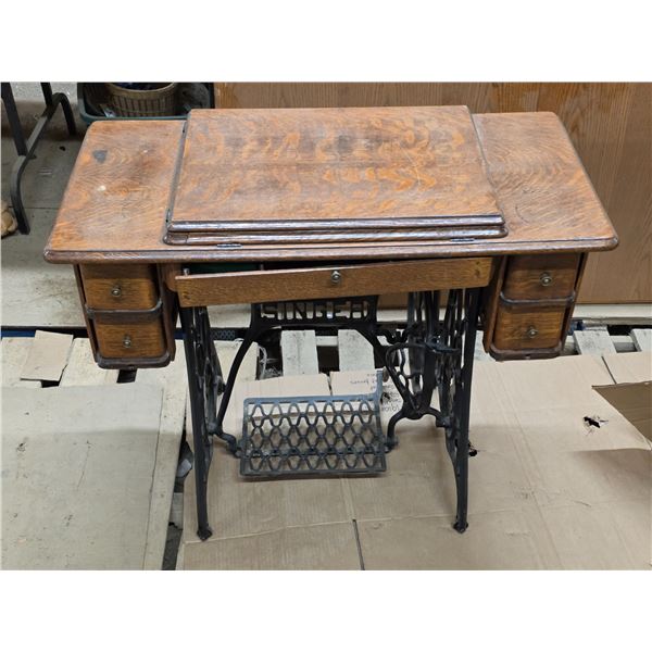 Singer sewing machine with treadle