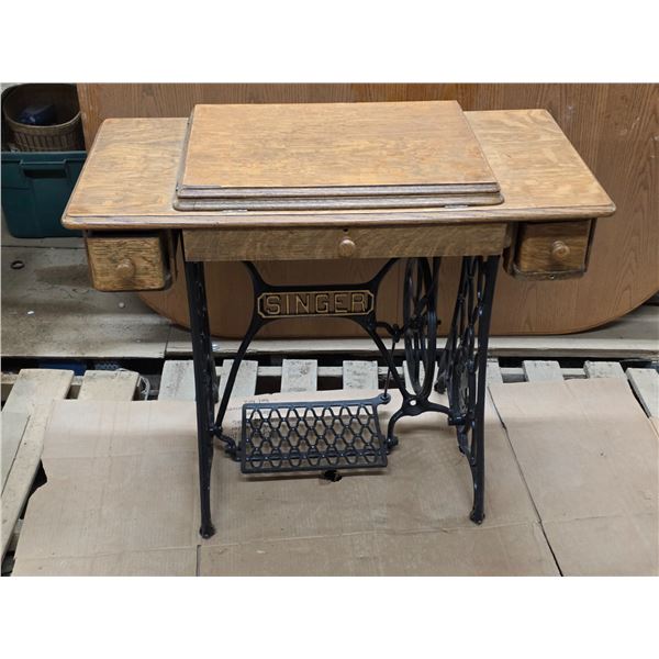 Singer sewing machine with treadle