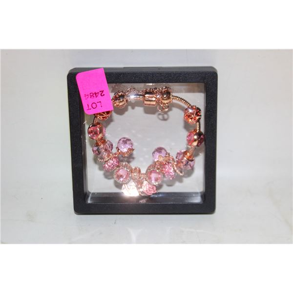 NEW CHARM BRACELET WITH AN ADJUSTABLE