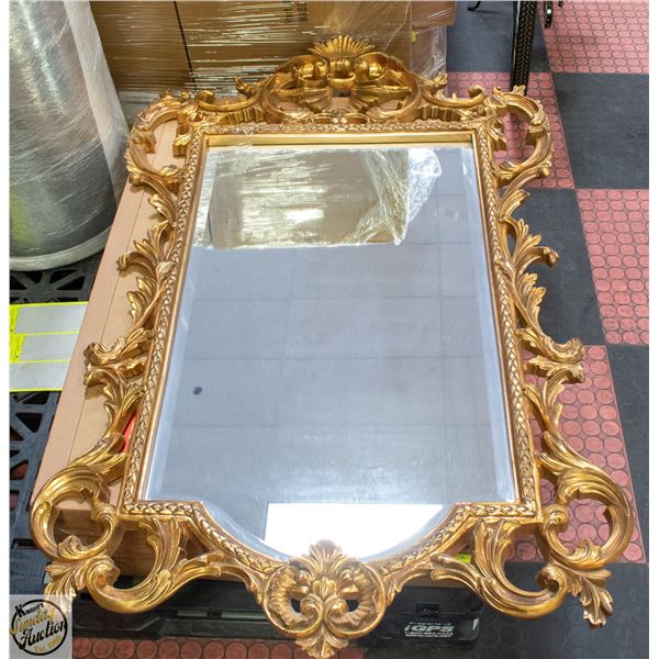 VINTAGE GOLD-TONED MIRROR WITH CARVED ACCENT