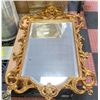Image 1 : VINTAGE GOLD-TONED MIRROR WITH CARVED ACCENT