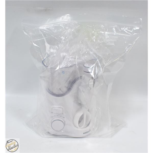 NEW REPACKED WATER-PIK COUNTERTOP