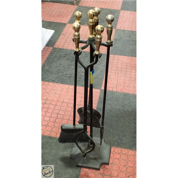 VINTAGE CAST IRON FIREPLACE TOOL ON RACK