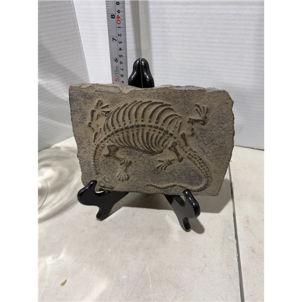 Dinosaur replica with stand