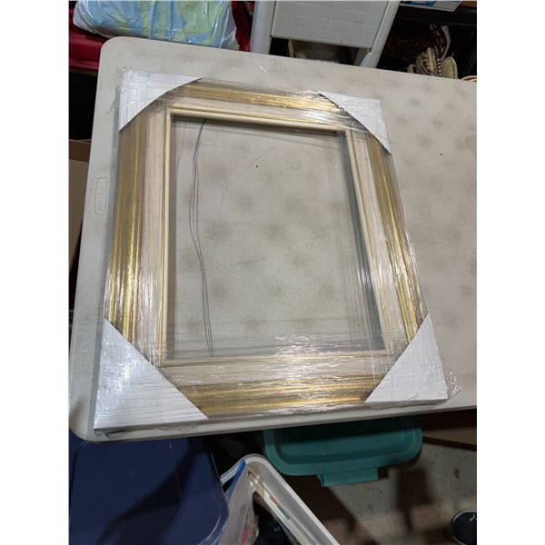 Frame measures 24" x 20"