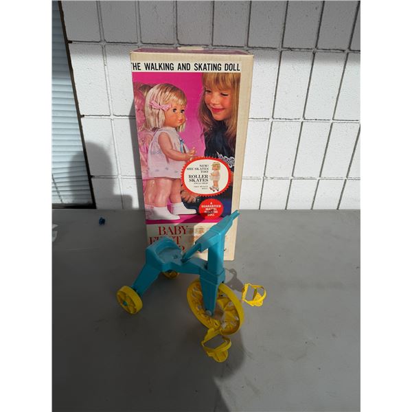 The walking and skating doll and tricycle