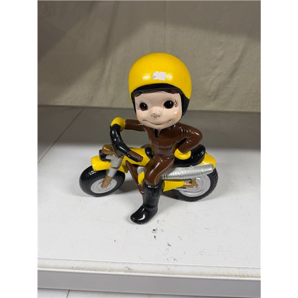 Vintage ceramic motorcycle rider, approximately 13 inches tall by 12 inches wide