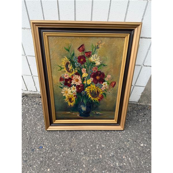 vintage floral still life oil painting featuring a bouquet of flowers in a vase, housed in a decorat