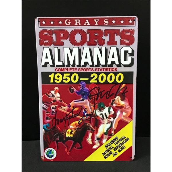 CHRISTOPHER LLOYD AND MICHAEL J FOX DUAL SIGNED SPORTS ALMANAC METAL SIGN - WWOC COA