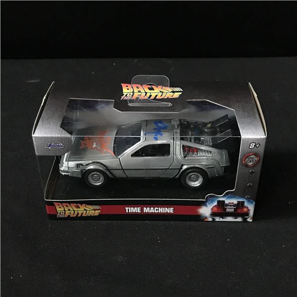 CHRISTOPHER LLOYD AND MICHAEL J FOX DUAL SIGNED DELOREAN DIE CAST (WWOC COA)