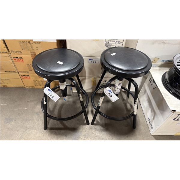 2 ULINE BLACK METAL FRAMED PADDED SWIVEL WAREHOUSE STOOLS