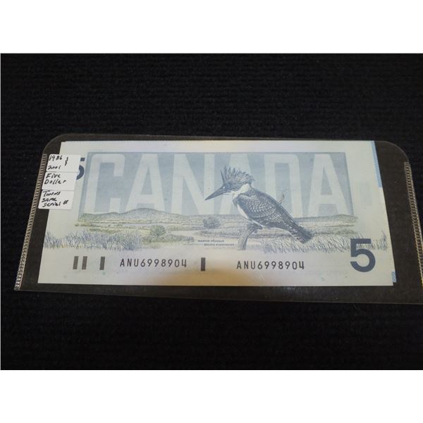 Two Canadian Five Dollar Bills